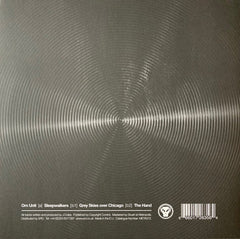 Om Unit : Sleepwalkers / Grey Skies Over Chicago / The Hand (12")