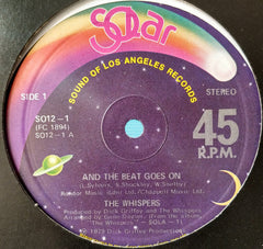 The Whispers : And The Beat Goes On (12")