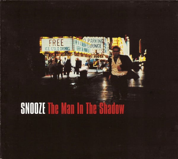 Snooze : The Man In The Shadow (CD, Album)
